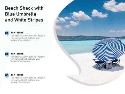 Beach shack with blue umbrella and white stripes