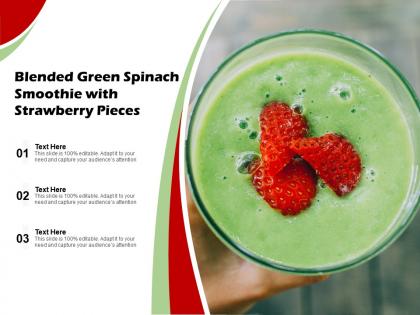Blended green spinach smoothie with strawberry pieces