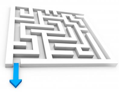 Blue arrow to show solution path from maze stock photo