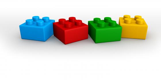 Blue red green yellow lego blocks in line stock photo