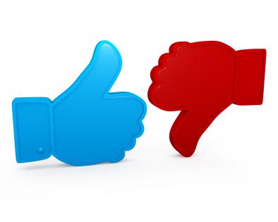 Blue thumb up for like and red for dislike stock photo