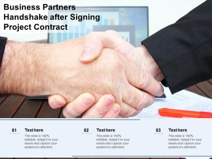 Business partners handshake after signing project contract