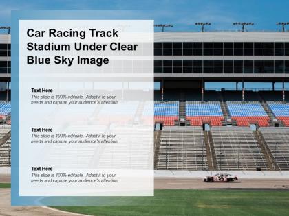 Car racing track stadium under clear blue sky image