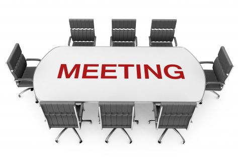 Chairs and table for team meeting with word meeting stock photo