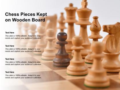 Chess pieces kept on wooden board