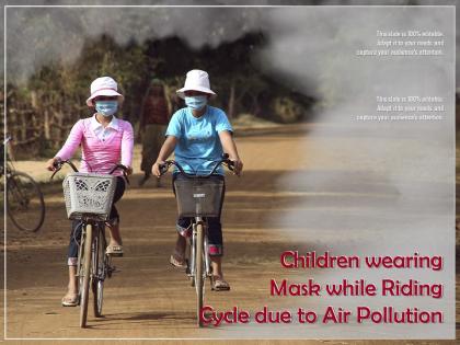 Children wearing mask while riding cycle due to air pollution