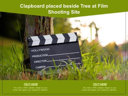 Clapboard placed beside tree at film shooting site
