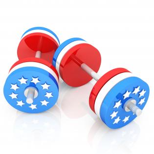 Classic dumbbells with american flag shows weight lifting stock photo