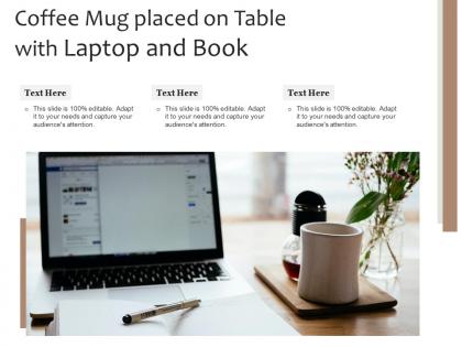 Coffee mug placed on table with laptop and book