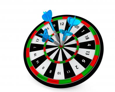 Colorful dart showing target with arrow hitting stock photo
