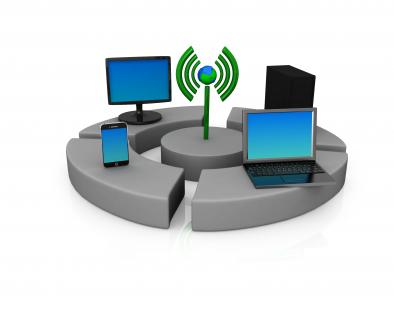 Computer devices connected through wi fi signal stock photo