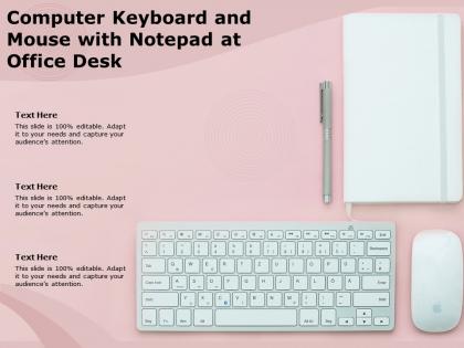 Computer keyboard and mouse with notepad at office desk