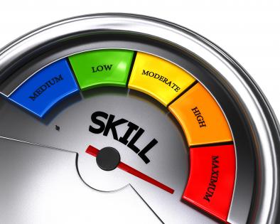 Conceptual meter showing maximum level of skill stock photo