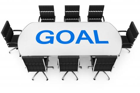 Conference table chairs with word goal stock photo