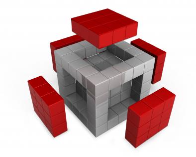 Cube with red sides on white background stock photo