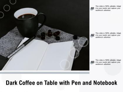 Dark coffee on table with pen and notebook