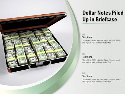 Dollar notes piled up in briefcase