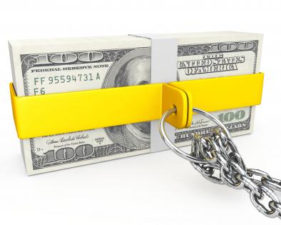 Dollars covered with chain stock photo
