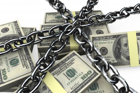Dollars surrounded with chain stock photo