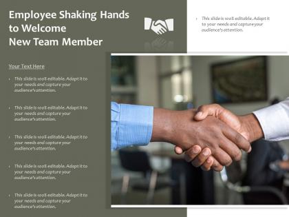 Employee shaking hands to welcome new team member