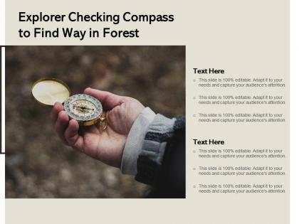 Explorer checking compass to find way in forest