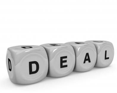 Four dices with deal text for business and sales stock photo