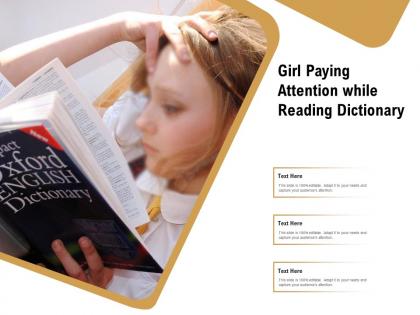 Girl paying attention while reading dictionary