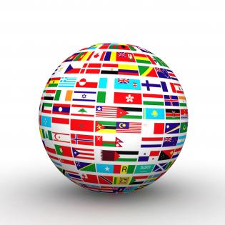 Globe build with multiple flags stock photo