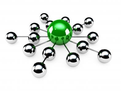 Green ball in centre making network with silver balls stock photo