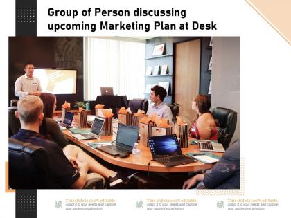 Group of person discussing upcoming marketing plan at desk
