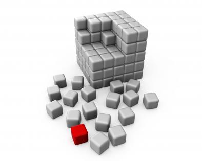 Half build cube with one red cube in side showing leadership concept stock photo