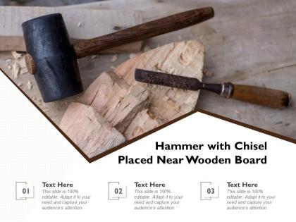 Hammer with chisel placed near wooden board