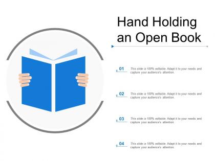 Hand holding an open book