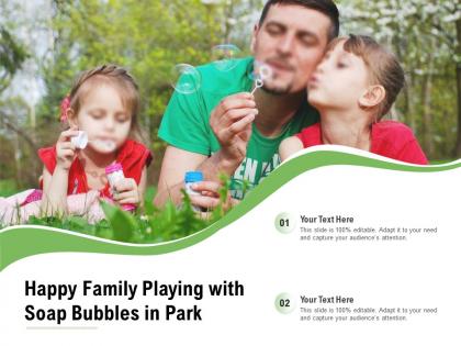 Happy family playing with soap bubbles in park