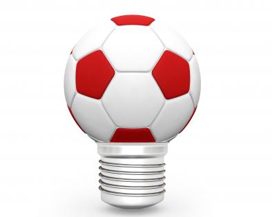 High resolution red and white football on stand stock photo
