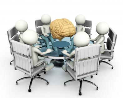 Human brain in the center of team stock photo