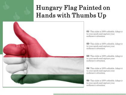 Hungary flag painted on hands with thumbs up