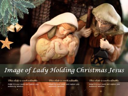 Image of lady holding christmas jesus