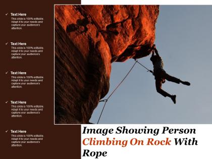 Image showing person climbing on rock with rope