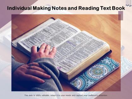 Individual making notes and reading text book