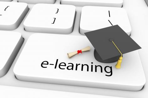 Key of e learning graduation cap with degree stock photo