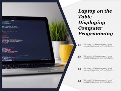 Laptop on the table displaying computer programming