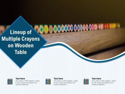 Lineup of multiple crayons on wooden table