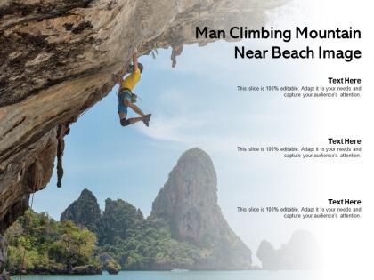 Man climbing mountain near beach image