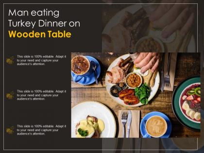 Man eating turkey dinner on wooden table