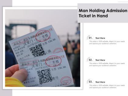 Man holding admission ticket in hand