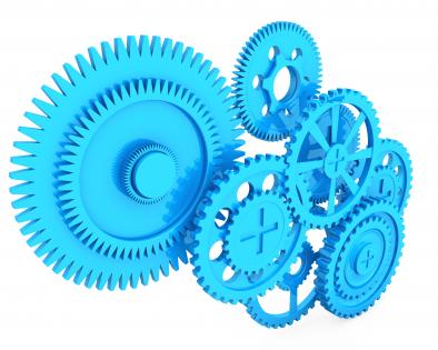 Many gears working together stock photo