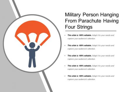 Military person hanging from parachute having four strings