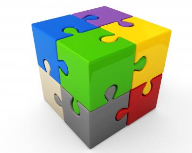 Multicolored puzzle cube for teamwork stock photo