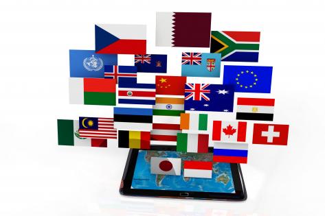 Multiple flag icons in tablet stock photo
